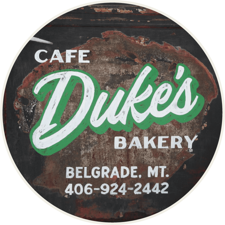 Duke's Cafe and Bakery welcome sign in Belgrade, Montana
